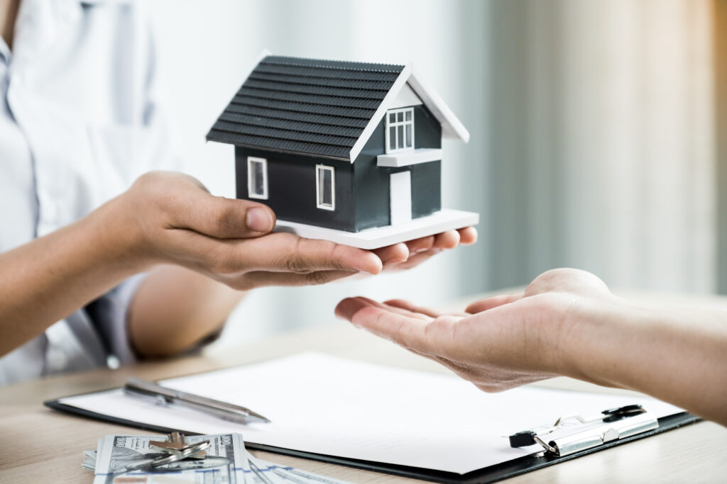 hand a real estate agent, hold the home model, and explain the b