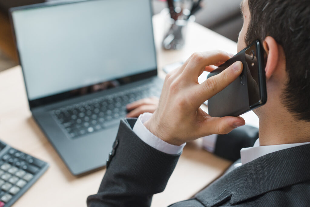 office desktop with laptop business man